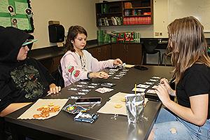 kids playing a card game